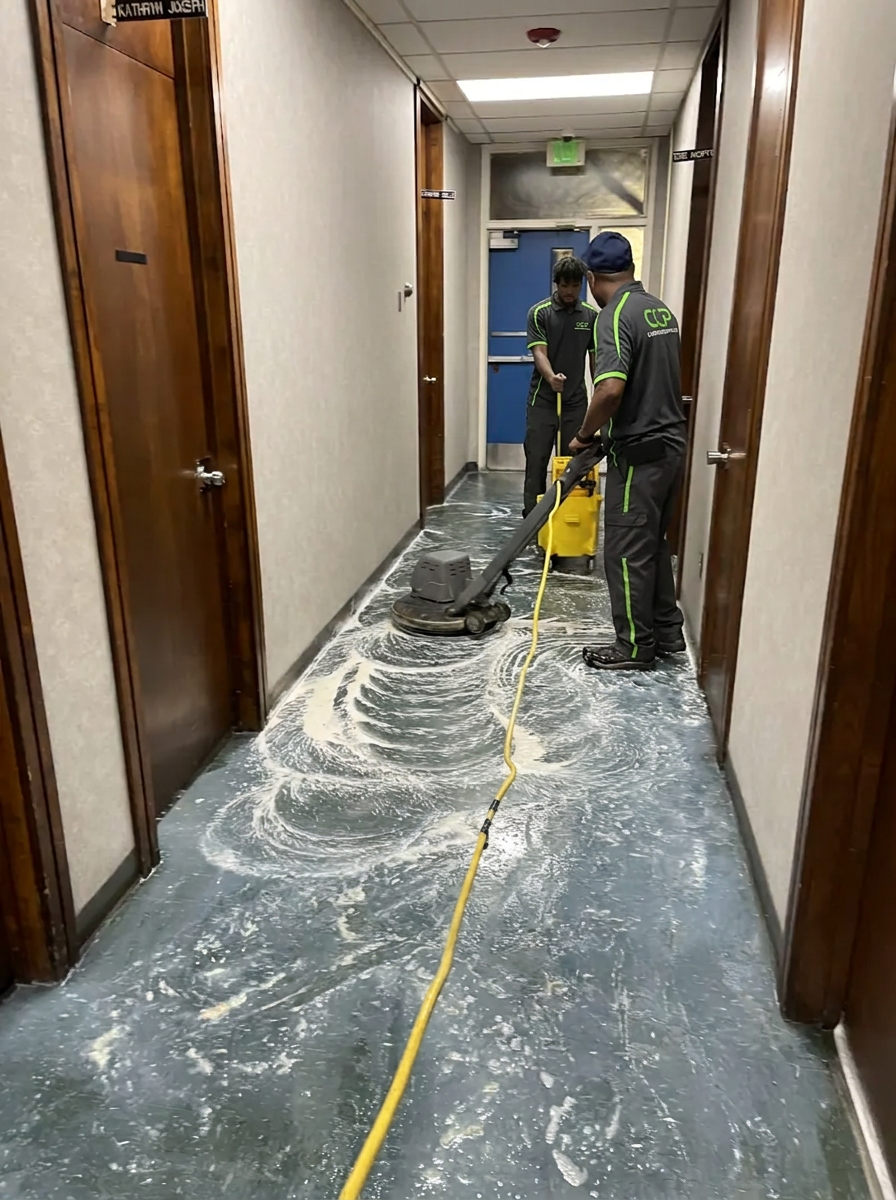 VCT floor strip-and-wax refinishing in progress